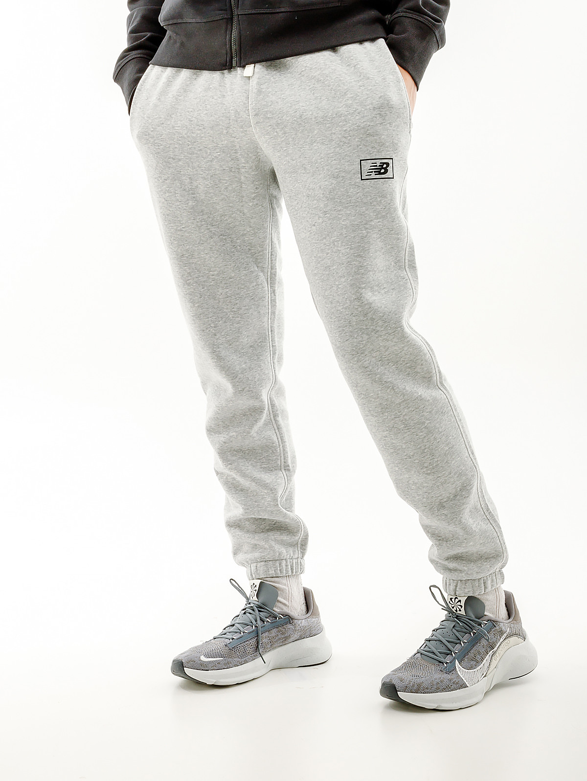 Штани New Balance Essentials Brushed MP33521AG
