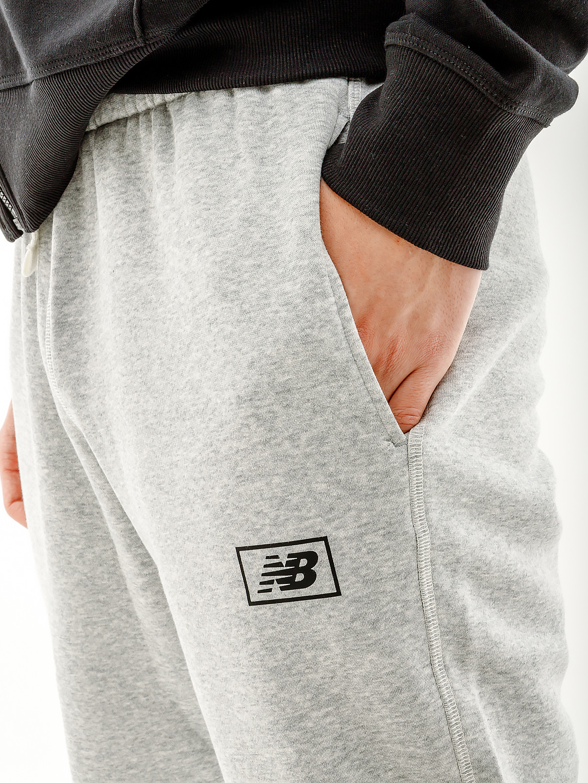 Штани New Balance Essentials Brushed MP33521AG