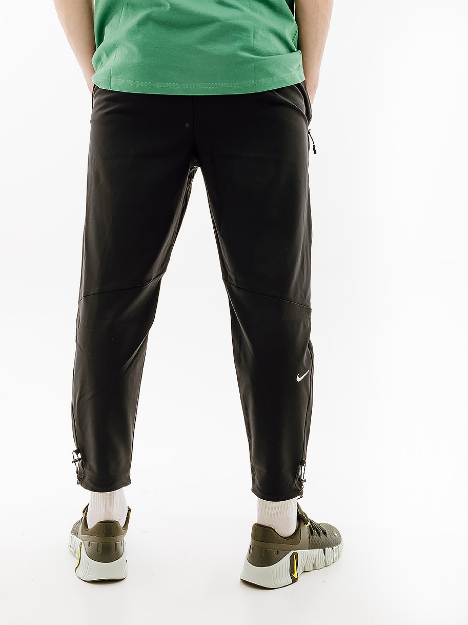 Штани Nike TRACK CLUB PANT FB5503-010